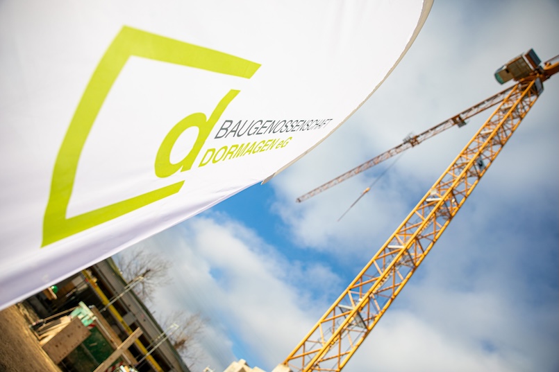 Baugenossenschaft Dormagen Banner und Baustelle